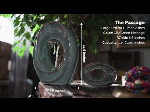 
                  
                    Load and play video in Gallery viewer, Handmade Cremation Urn for Ashes &quot;The Passage&quot; - Large | Oily Green Melange | Ceramic
                  
                