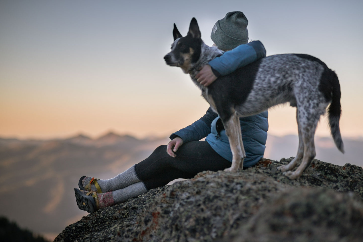 Dog and woman on a hill. Pet Cremation article by Pulvis Art Urns
