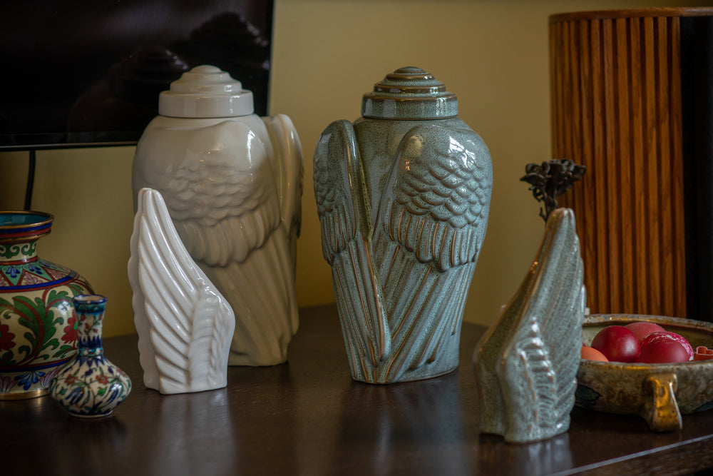 Handmade Cremation Urn for Ashes "Wings" by Pulvis Art Urns. Photo of Wings handmade urn for collection.