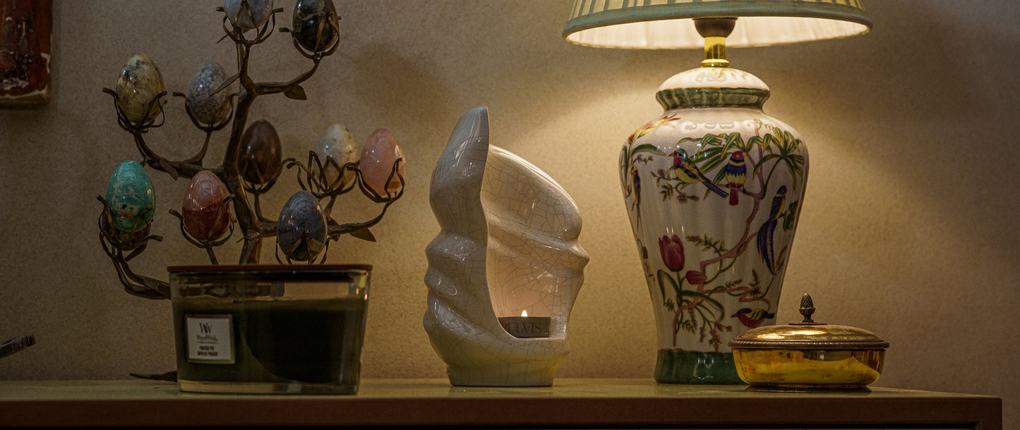 Handmade Art Keepsakes by Pulvis. Photo of a stone handmade urn for ashes for Pulvis Art urns official website.