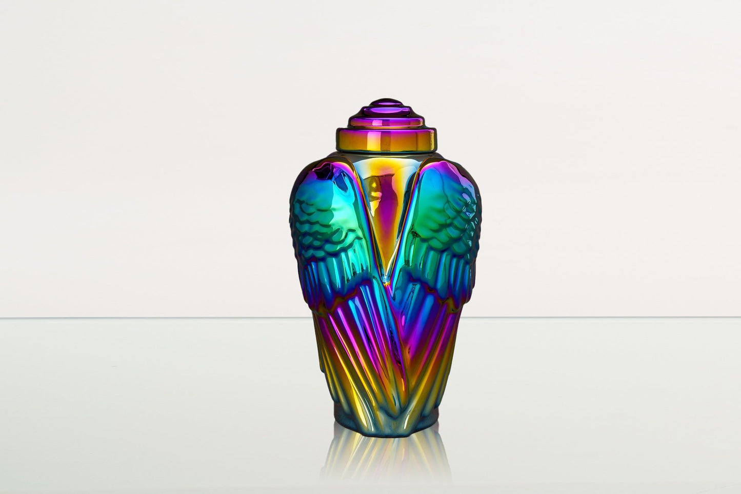 
                  
                    Pulvis Art Urns Adult Size Urn Exclusive Cremation Urn for Ashes "Wings" - Large | Rainbow Chrome Urn
                  
                