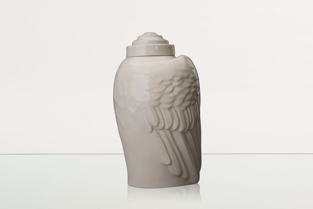 
                  
                    Pulvis Art Urns Adult Size Urn Handmade Cremation Urn for Ashes "Wings" - Large | Transparent | Ceramic Urn
                  
                