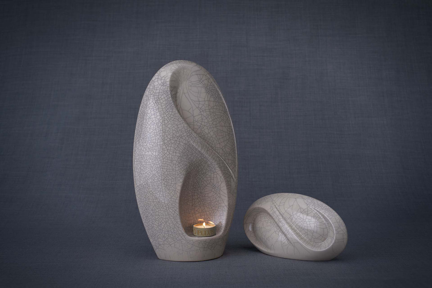 
                  
                    Pulvis Art Urns Adult Size Urn + Keepsake Urn Set Of Ceramic Art Urns for Ashes "Eternity" - (Large urn + Keepsake)
                  
                
