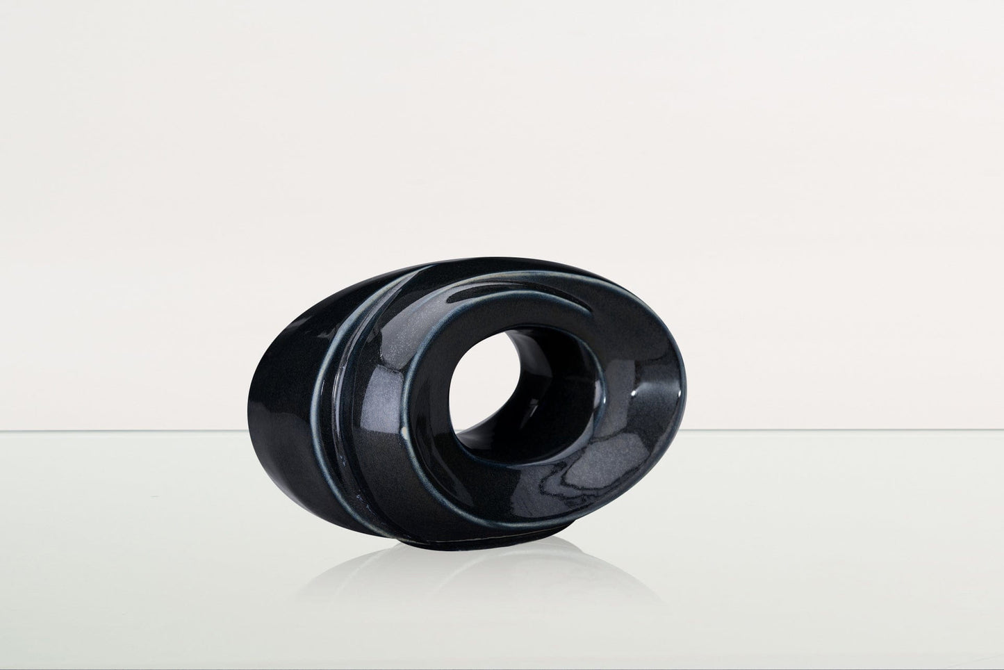 
                  
                    Pulvis Art Urns Keepsake Urn Handmade Cremation Keepsake Urn "The Passage" - Small Urn | Black Gloss Melange | Ceramic
                  
                