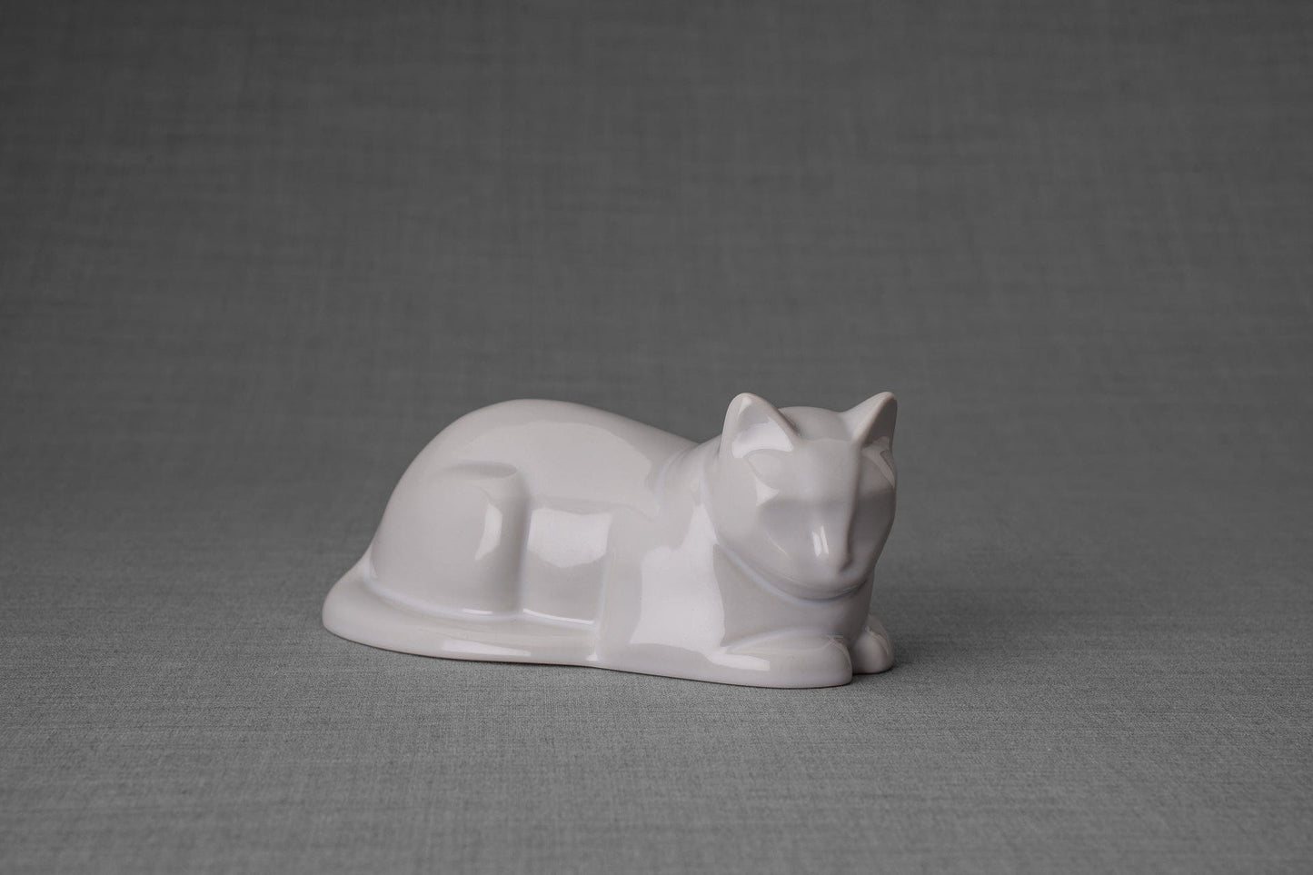 
                  
                    Pulvis Art Urns Pet Urn Mini Laying Cat Cremation Urn - White| Ceramic
                  
                