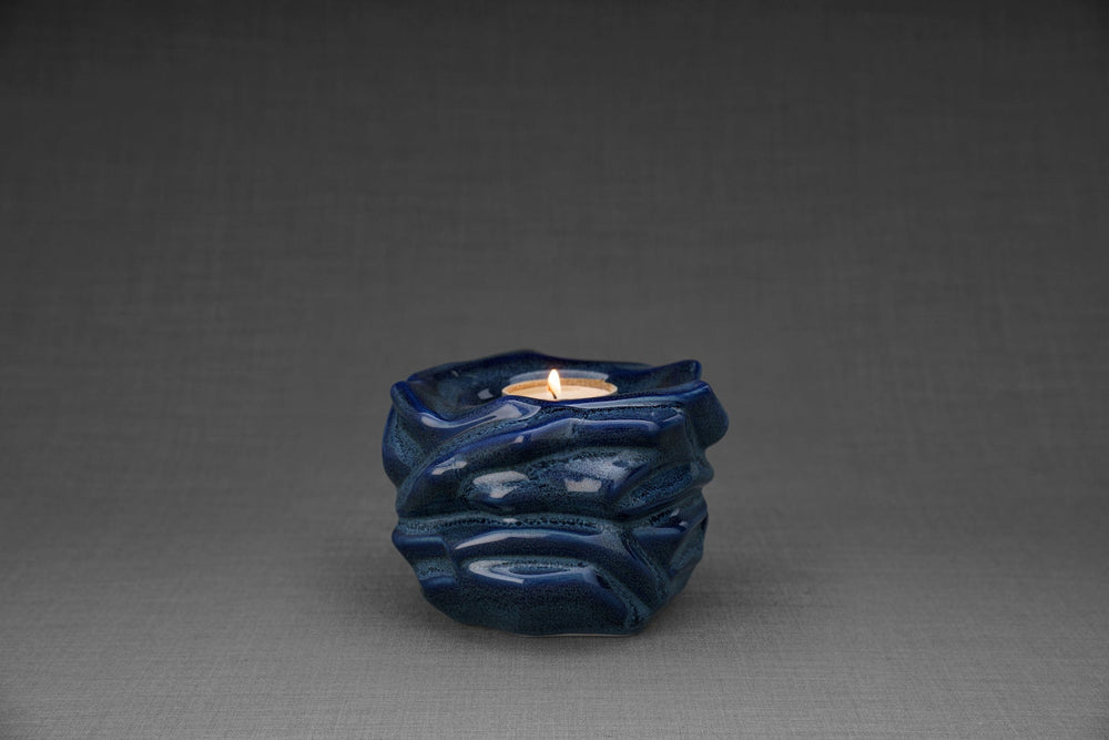
                  
                    Pulvis Art Urns Keepsake Urn Handmade Cremation Keepsake Urn "The Christ" - Small | Blue Melange | Ceramic
                  
                