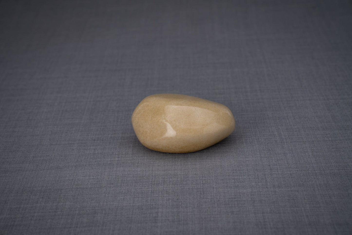 
                  
                    Pulvis Art Urns Keepsake Urn Handmade Mini Keepsake Urn "Palm Stone" - Light Sand | Ceramic
                  
                