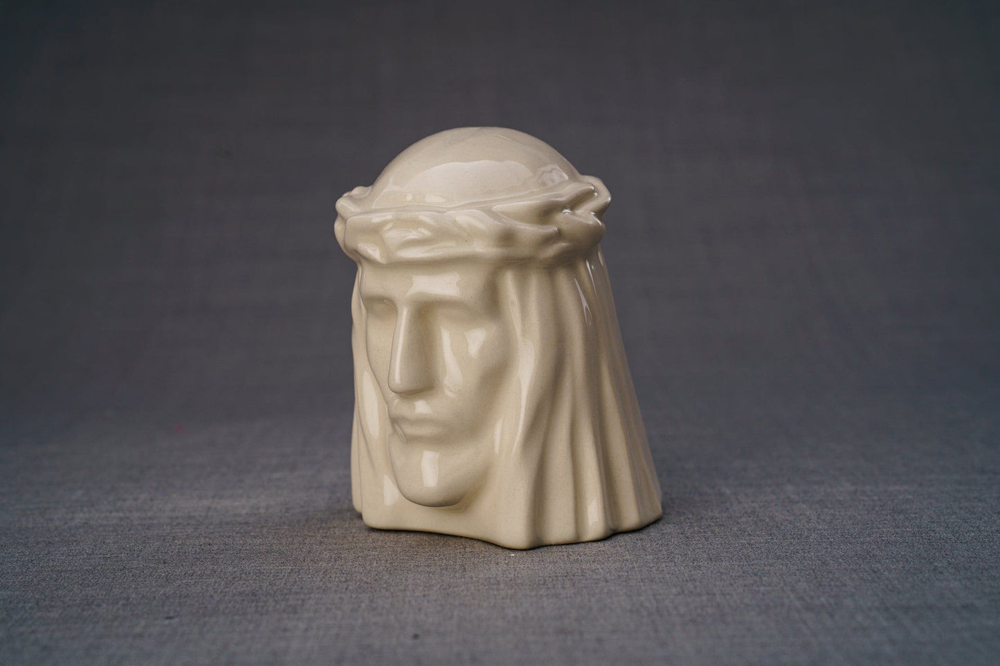 
                  
                    Pulvis Art Urns Keepsake Urn Handmade Mini Keepsake Urn "The Christ" - Transparent | Ceramic
                  
                